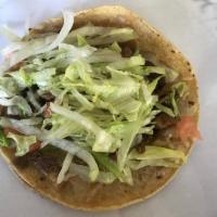 Papacito's Taco · Corn or flour tortilla with your choice of chicken, steak, ground beef, bean, veggie, or gua...