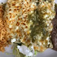 Cheese Enchiladas Suizas Plate · 3 corn tortillas rolled and filled with melted cheese. Topped with choice of Papacito's home...