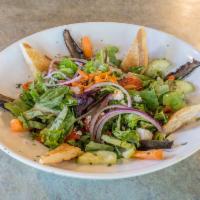 Big Green Salad · Field greens, tomato, red onions, carrots, cucumbers, croutons, and sliced egg with your cho...