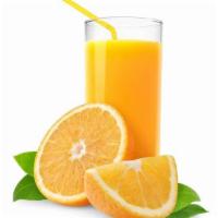 Jugos de Naranja · Oranges squeezed instantly to delight a very fresh and natural juice