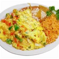 Huevos a la Mexicana · Scrambled eggs, jalapenos, onions and tomatoes. Served with rice, beans and tortilla.