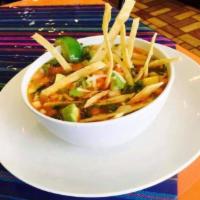 Sopa de Tortilla · Homemade soup with shredded chicken, avocados, crispy tortillas strips topped with cilantro ...