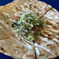 Quesadillas Mexicanas · Flour tortilla with Jack cheese, your choice of shredded beef, ground beef or chicken, toppe...