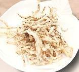 Crazy Squid Hair · Fried shredded squid and a sprinkle of Parmesan cheese with spicy dipping sauce.