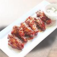 6 Korean Chicken Wings · Fried chicken wings, side of pickled radish. Your choice of wing flavor.