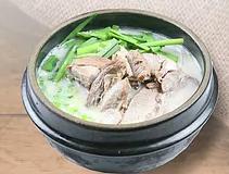 Pork Bone Soup · Pork bone both with sliced pork meat, scallions and chives. Spicy sauce on the side.