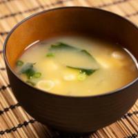 Miso Soup · Soybean based soup with tofu seaweed and green onion.