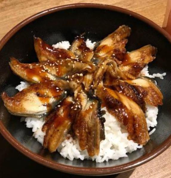 Unagi Don Sushi · Sushi rice topped with 10 pieces slices of BBQ eel.