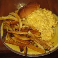 Mac and Cheese Burger · Our house made mac and cheese smothered over a ½ lb. burger on a grilled pub bun, hold the v...