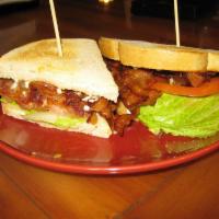 Classic BLT Sandwich · Smoked bacon, lettuce and tomatoes on toasted sour dough bread.