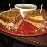 Pastrami Reuben · Grilled pastrami, sauerkraut and Swiss cheese with 1000 Island spread on grilled marbled rye...