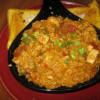 Jambalaya · A Louisiana dish with andouille sausage, shrimp, and chicken in a delicious vegetable sauce ...
