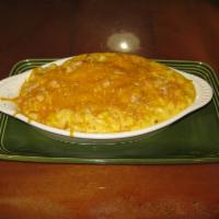 Macaroni and Cheese · A huge portion of mac noodles covered in our house made cheese sauce. Choose bacon bits or h...
