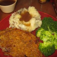 Chicken Fried Steak · A fresh top sirloin steak hand cubed and breaded with crushed corn flakes served with mashed...