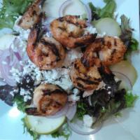 Pear Salad with Grilled Shrimp · Mesclin, fresh sliced pear, red onion, goat cheese and house dressing.