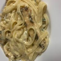 Fettuccine Alfredo & Grilled Chicken and Mushrooms. · Grilled chicken and mushrooms.