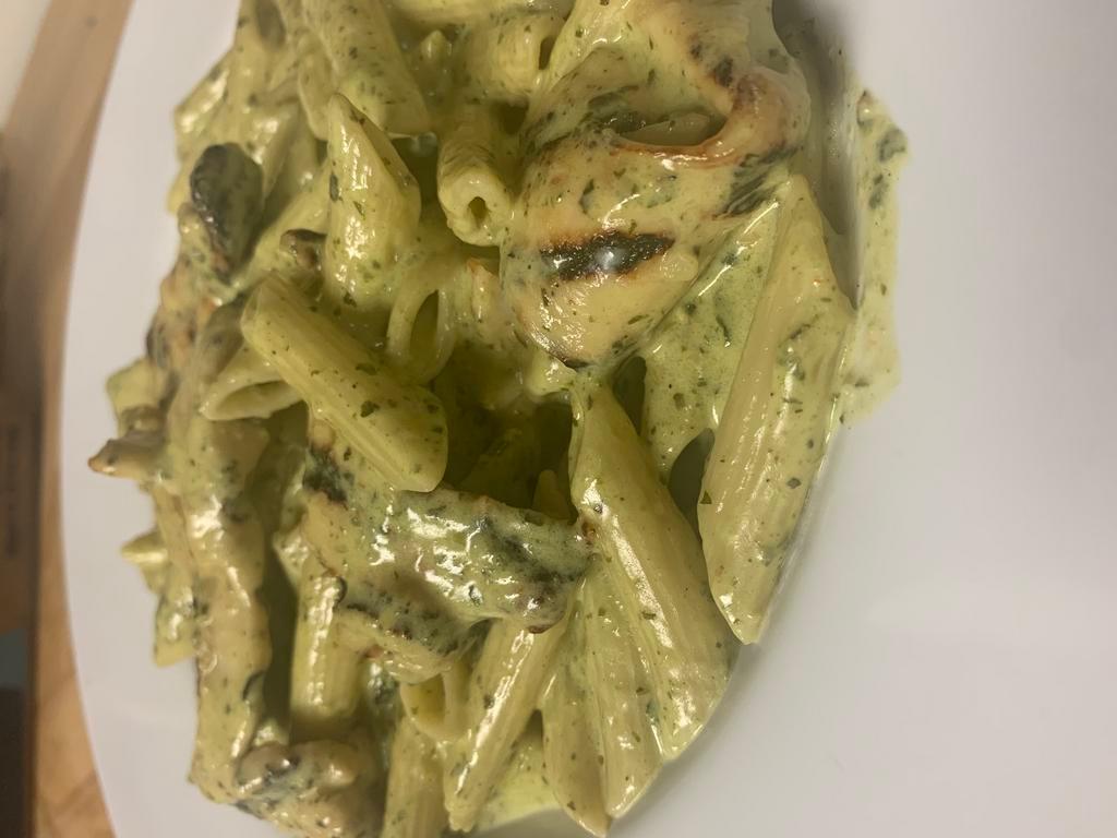 Pasta Pollo Genovese A thick  Creamy · Pesto sauce tossed with spiral shaped penne pasta and grilled chicken.