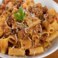 Rigatoni Bolognese.( Meat Sauce) · Veal,Beef..