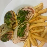 Caesar Chicken Salad Wrap · Grilled chicken, romaine lettuce, red onions and caesar dressing on your choice of wrap .wit...