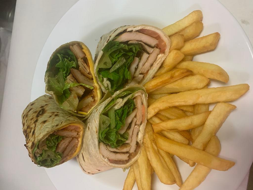 BLT Wrap · Bacon, lettuce, tomato and mayo on your choice of wrap . with fries.