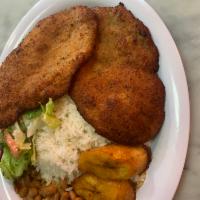 Pechuga De Pollo Milanesa · Fried chicken breast , served  with rice ,beans, salad ,and sweet plantains.