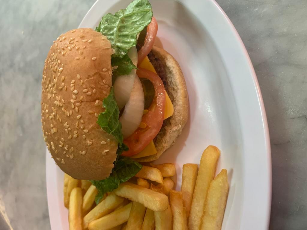 Lunch special Only Cheese Burger lux With Fríes  One  Can Soda  ·  Coca Cola or Sprite 