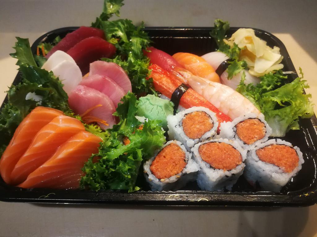 Sushi and Sashimi Combo · Nine pieces of sashimi, five pieces of sushi and a spicy tuna roll.