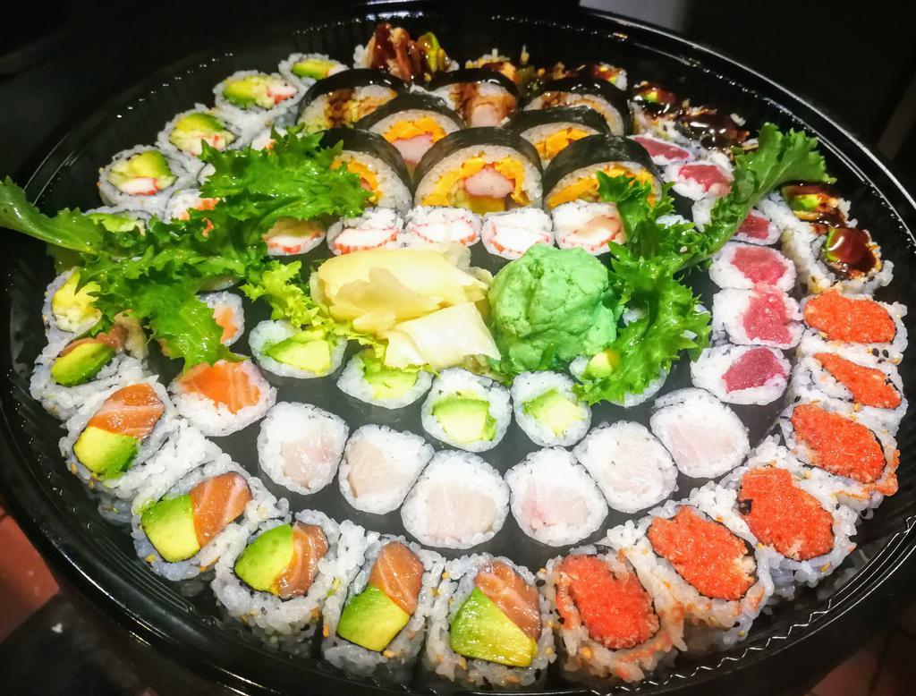 Sushi Party A · 11 roles for FOUR people. SUSHI ROLLS: Crab Meat Roll, Tuna Roll, Salmon Roll, Spicy Tuna Roll, Futo maki, Eel Avocado Roll, Shrimp Tempura Roll, California Roll, Avocado Roll, Alaska Roll, Yellowtail roll.