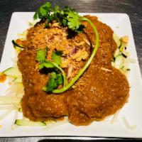 A2. Satay Tofu · Crispy tofu stuffed with cucumbers and bean sprouts topped with peanut sauce.