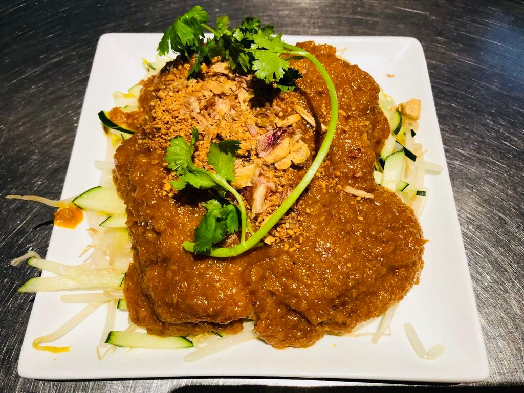 A2. Satay Tofu · Crispy tofu stuffed with cucumbers and bean sprouts topped with peanut sauce.