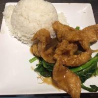R11. Fillet Flounder with Green Vegetables On Rice · with brown sauce