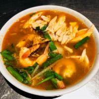 W15. Ipoh Chicken Noodle Soup · Famous noodles with shredded chicken, shrimp, garlic chives and bean sprouts in shrimp broth...