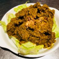 B3. Beef Rendang · Dry curry beef cooked with a spicy paste and lemongrass in coconut milk