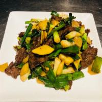 B9. Beef in Scallion and Ginger · Sauteed beef with scallion and ginger in brown sauce.