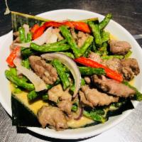 B10. Beef with String Beans in Thai Style Sauce · Sauteed beef with onion, green pepper, and spicy green curry in coconut milk.
