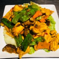 C6. Tangy Spicy Chicken in Thai Style · Sauteed chicken with straw mushroom, snow peas, carrot, bamboo shoot and basil leaf in spicy...