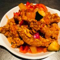 C11. Sweet and Sour Chicken · Chicken lightly battered and stir-fried in sweet and sour sauce