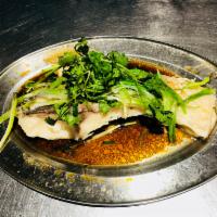 Steamed Carp Fish with Ginger Sauce · Steam carp fish with ginger, scallion and soy sauce.