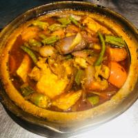 Asam Fish Head or stingray fish Casserole · steamed fish head with onion, lady finger, string bean, tomato, crispy tofu, eggplant, in as...
