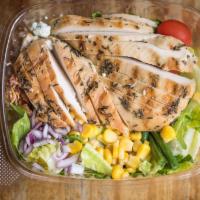 Grilled Chicken Breast Salad · Romaine lettuce, tomatoes, cucumbers and carrots with grilled marinated breast of chicken.