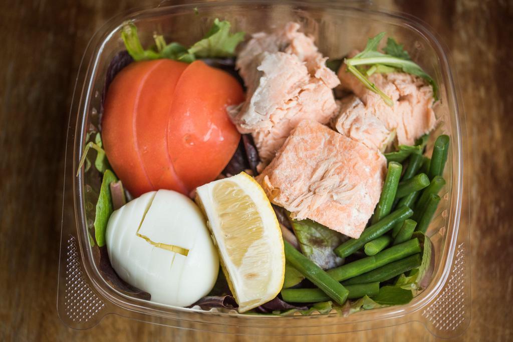 Salmon Salad · Baby lettuce, tomatoes, poached salmon and a hard boiled egg.