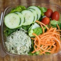 Basil Chicken Salad · Romaine lettuce, tomatoes, cucumber and carrots.