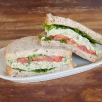 Basil Chicken Salad Sandwich · Roasted chicken breat salad, romaine lettuce, tomatoes and watercress on whole wheat bread
