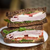 Ham and Brie Sandwich · French ham, brie cheese, tomatoes, watercress, lemon mayo and Dijon mustard on pumpernickel ...