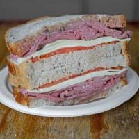 Roast Beef Sandwich · With horseradish, Dijon mustard, provolone cheese and tomato on rye bread