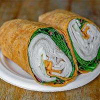 Turkey Wrap · Smoked turkey, brie cheese, Granny Smith apple, baby lettuce and honey mustard on sun-dried ...