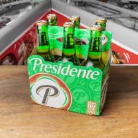 Presidente Cerveza Pilsener Beer · 12 oz. 6 pack bottles. Pilsner, 4.0% ABV. Santo Domingo. Very alcoholic aftertaste, it smell...