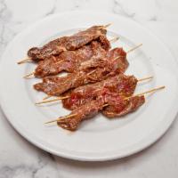 4 Beef on a Stick Marinated in Korean Sesame Sauce · Serves 2-3. This item is uncooked.