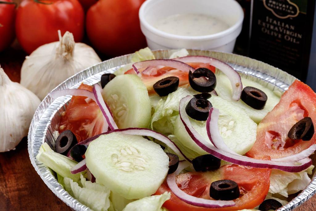 Greek Salad · Our garden salad with feta cheese and Kalamata olives.