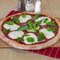 Red Margherita Pizza · Fresh mozzarella, chopped fresh basil, and plum tomatoes sauce.